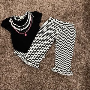 Black, White, Silver, and Pink Baby Gear Outfit